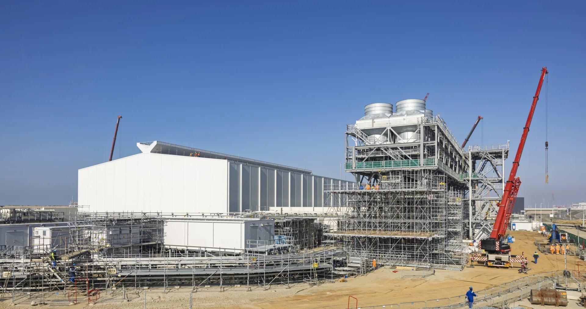 Green hydrogen plant under construction during piping cleaning and drying precommissioning project